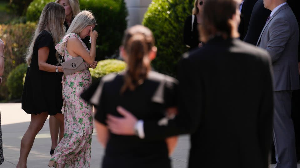 Mourners arrive for the joint funeral of NHL player Johnny Gaudreau and his brother Matthew Gaudreau. - Matt Rourke/AP