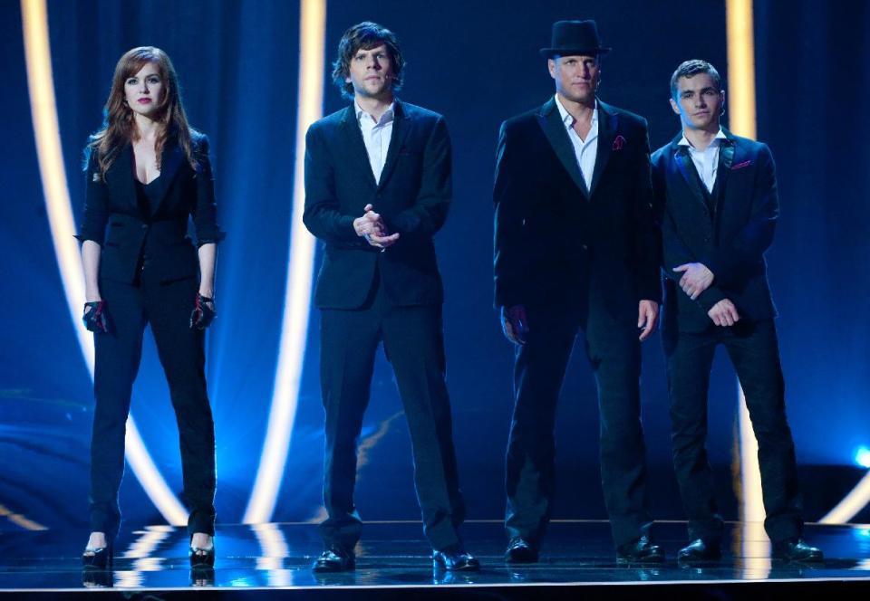 This film image released by Summit Entertainment shows, from left, Isla Fisher, Jesse Eisenberg, Woody Harrelson and Dave Franco in a scene from "Now You See Me." (AP Photo/ Summit Entertainment, Barry Wetcher)