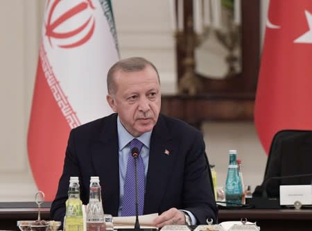 Turkish President Erdogan is seen during trilateral talks with his counterparts Rouhani of Iran and Putin of Russia in Ankara