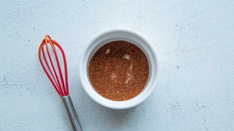 whisk and spice mix in bowl