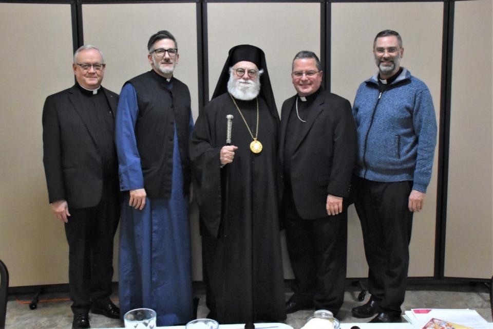 In 2022, Rev. Shawn Conoboy (right) hosted "The Meeting of Two Bishops: East and West" which he organized as the diocesan director of the Office for Ecumenical and Interreligious Affairs. With him are (l-r) Monsignor Robert Siffrin, Rev.. Joseph Distefano, Metropolitan Savas Zembillas of the Greek Orthodox Metropolis of Pittsburgh, and Bishop David Bonnar, head of the Catholic Diocese of Youngstown.
(Photo: Bob Zajack, Catholic Diocese of Youngstown)