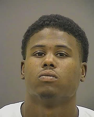 Raymon Carter, 24, is seen in an undated picture released by the Baltimore Police Department in Baltimore, Maryland. REUTERS/Baltimore Police Department/Handout