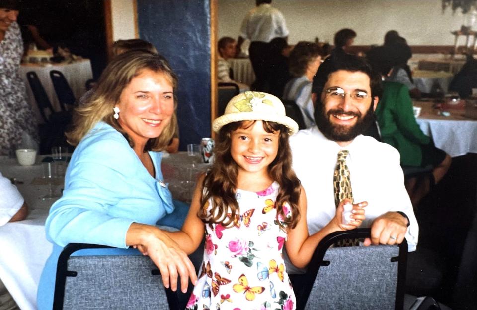 Jonathan Sugarman is pictured with his wife Terese and his daughter Maya in 1997.