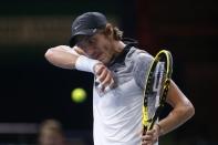 Lucas Pouille of France reacts during his men's singles tennis match against Switzerland's Roger Federer in the third round of the Paris Masters tennis tournament at the Bercy sports hall in Paris, October 30, 2014. REUTERS/Benoit Tessier