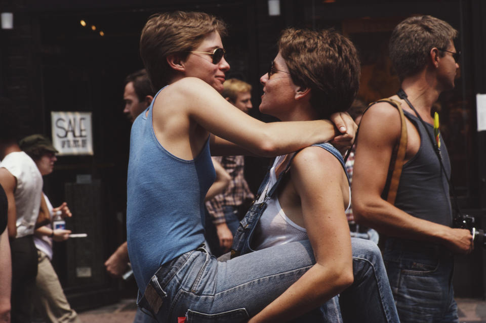 Two women embrace during the gay Pride parade in New York City,&nbsp;June 1982.