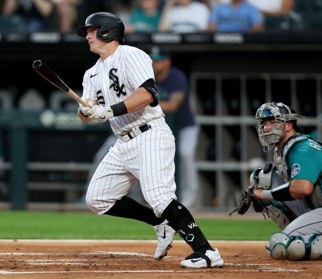 Chicago White Sox first baseman Andrew Vaughn, right, makes a