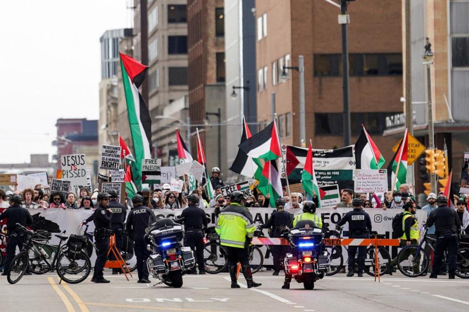PHOTO: Police keep back demonstrators calling for a ceasefire in Gaza, amid the ongoing conflict between Israel and Hamas, near the campaign headquarters of President Joe Biden for the state of Wisconsin, in Milwaukee, Wis., March 13, 2024.   (Kevin Lamarque/Reuters)