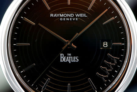 A Raymond Weil Maestro Beatles watch is displayed at the Baselworld Watch and Jewellery Show in Basel, Switzerland March 23, 2017. REUTERS/Arnd Wiegmann