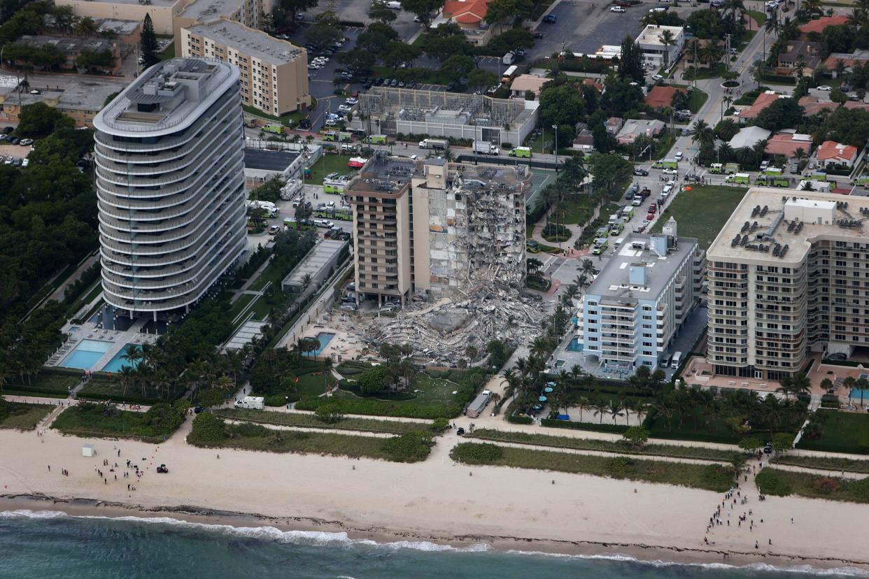 Search and rescue personnel work in the rubble of the 12-story condo tower that partially collapsed on June 24, 2021 in Surfside, Florida.