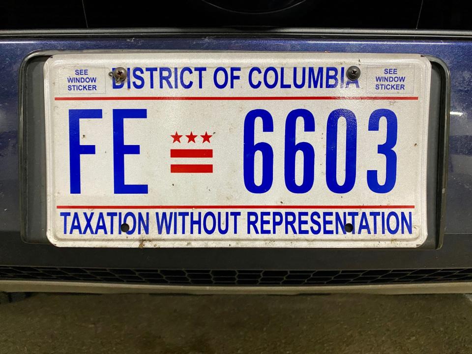 A D.C. license plates bear the phrase "Taxation Without Representation," repurposing the popular rallying cry of the American Revolution to note that D.C. residents pay more in federal income taxes than residents of 22 states, but do not enjoy the representation that comes with statehood. (Photo: DANIEL SLIM via Getty Images)