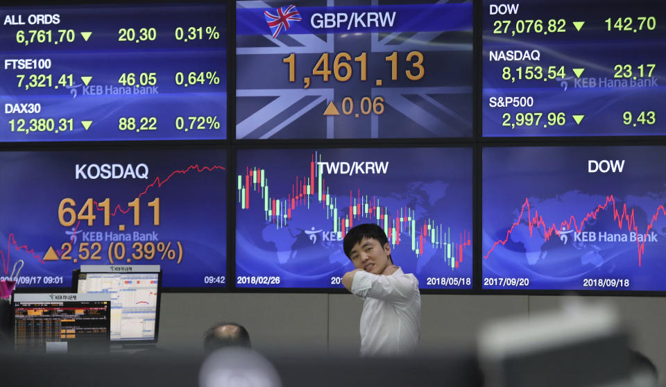 A currency trader works at the foreign exchange dealing room of the KEB Hana Bank headquarters in Seoul, South Korea, Tuesday, Sept. 17, 2019. Shares were mostly lower in Asia on Tuesday after an attack on Saudi Arabia’s biggest oil processing plant caused crude prices to soar, prompting selling of airlines and other fuel-dependent industries. (AP Photo/Ahn Young-joon)