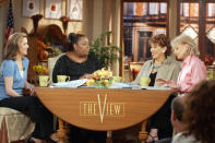 FILE - Co-hosts, from left, Meredith Vieira, Star Jones, Joy Behar and Barbara Walters sit on the set of "The View" on June 5, 2003, in New York. Walters, a superstar and pioneer in TV news, has died, according to ABC News on Friday, Dec. 30, 2022. She was 93. (AP Photo/Ed Bailey, File)
