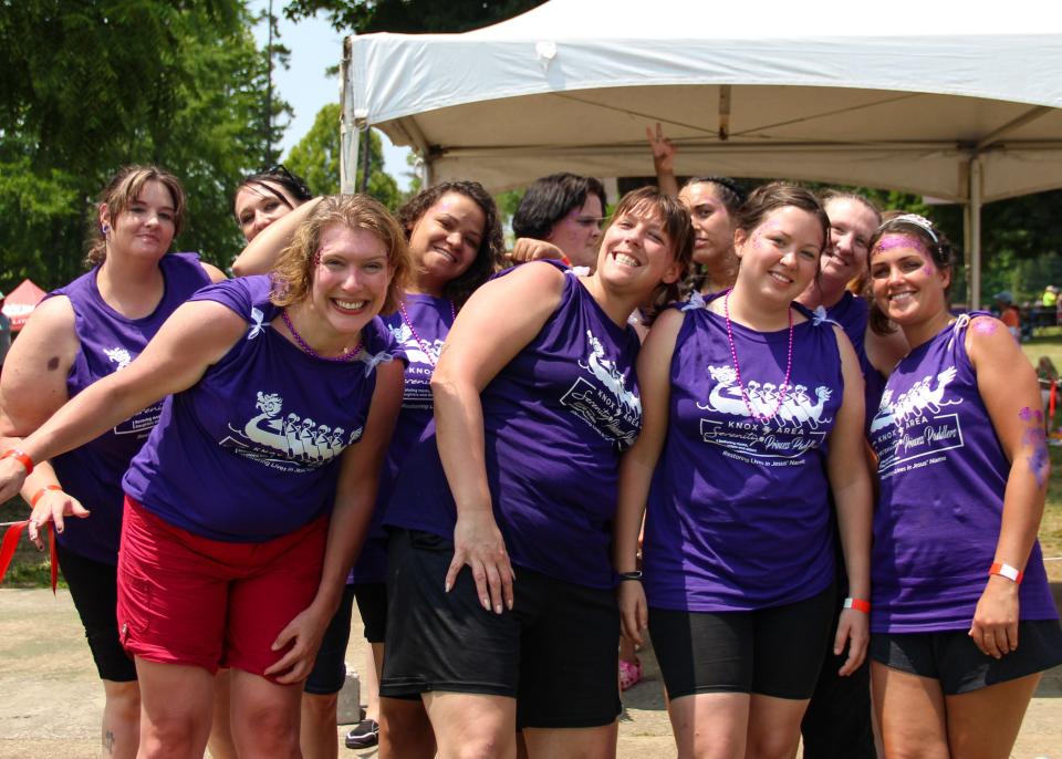 The Serenity Team gets ready to take to the water during the annual KARM Dragon Boat Festival held at the Cove at Concord Park on June 17, 2023.