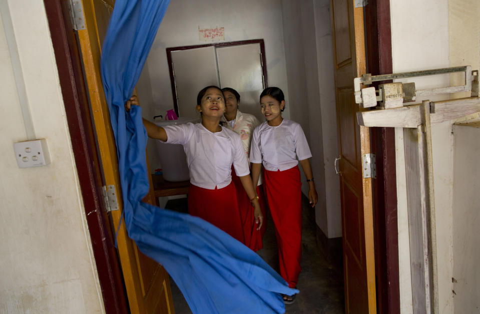 In this Jan. 17, 2014 photo, trainee Rohingya nurses at Dapaing Village Hospital in north of Sittwe, Rakhine state, Myanmar. Data on Rohingya health is almost nonexistent. However, Rakhine is the nation's second-poorest state and lives have always been at greater risk there. Away from the camps, in isolated and predominantly Muslim northern Rakhine state, the health situation is even worse and reaching a hospital is nearly impossible. (AP Photo/Gemunu Amarasinghe)