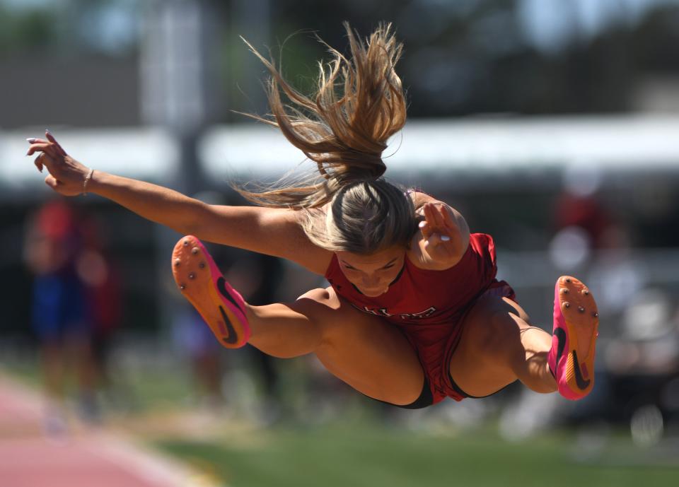 New Home's Kristen McWhirter competes in the long jump at the District 5-2A track and field meet Wednesday, April 3, 2024, in Post.