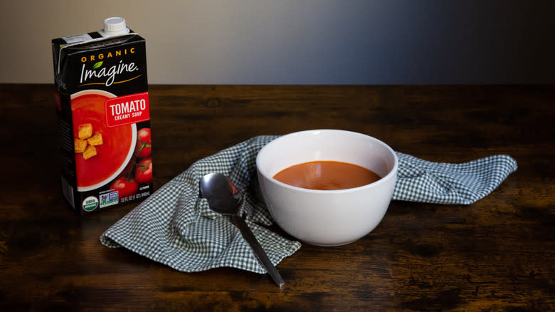 tomato soup served on table 