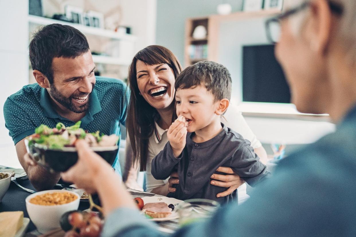 family laughing at funny food jokes