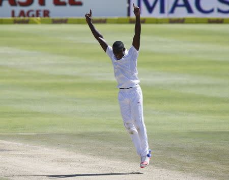 South Africa's Kagiso Rabada celebrates the wicket of England's Nick Compton (not in picture) during the second cricket test match in Cape Town, South Africa, January 2, 2016. REUTERS/Mike Hutchings