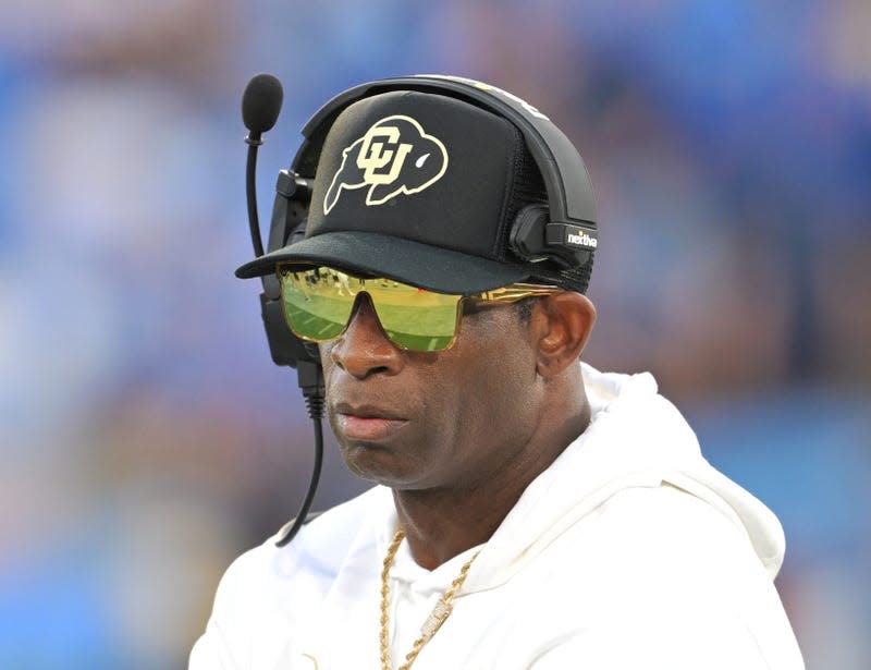 Head Coach Deion Sanders looks off during the first half as the Colorado Buffaloes play the UCLA Bruins on October 28, 2023 in Pasadena, California.