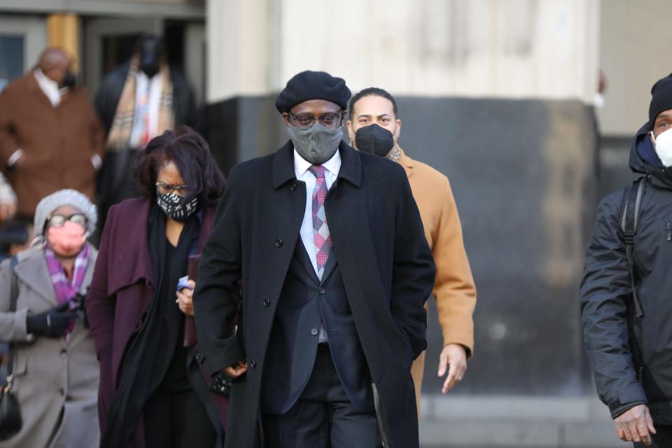 Former Detroit City Council Member Andre L. Spivey walks out of federal court after being sentenced for two years after pleading guilty in his corruption and bribery case in Detroit on Wednesday, Jan. 19, 2022. 