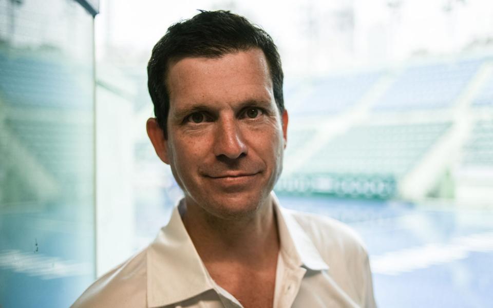 Former British tennis number one player Tim Henman poses during an interview with AFP - AFP