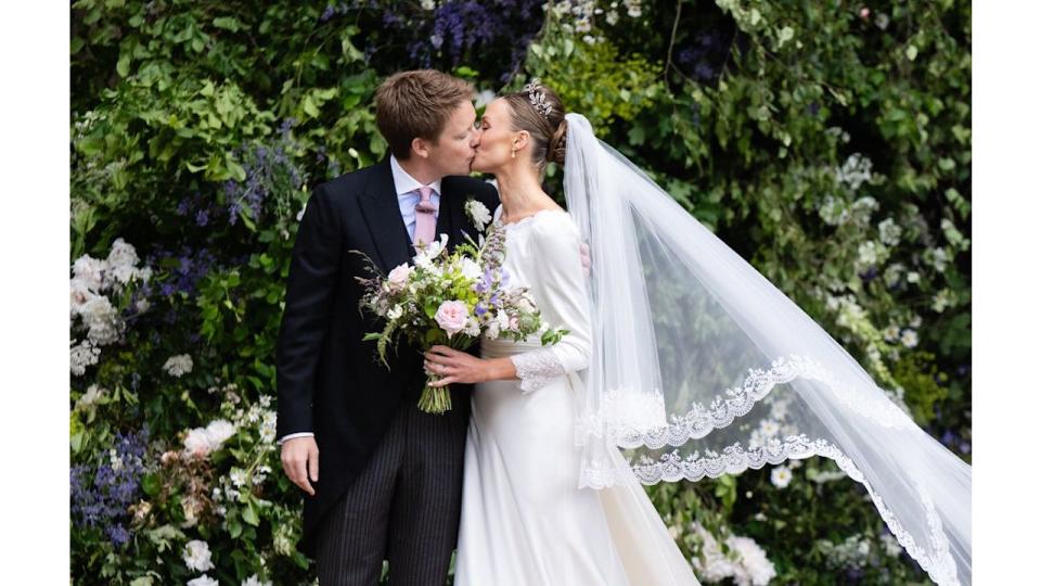 Hugh Grosvenor kissing his new wife Olivia Henson