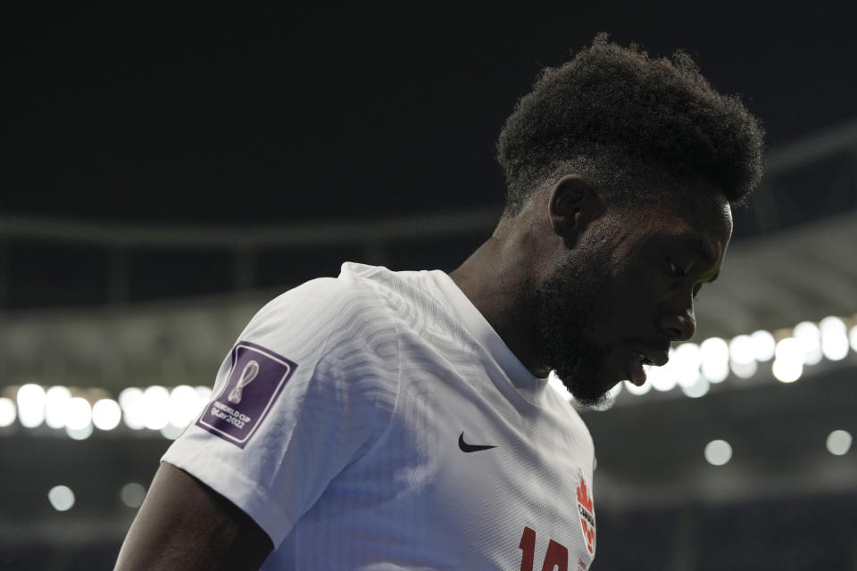 Canada's Alphonso Davies during the World Cup group F soccer match between Belgium and Canada, at the Ahmad Bin Ali Stadium in Doha, Qatar, Wednesday, Nov. 23, 2022. (AP Photo/Hassan Ammar)