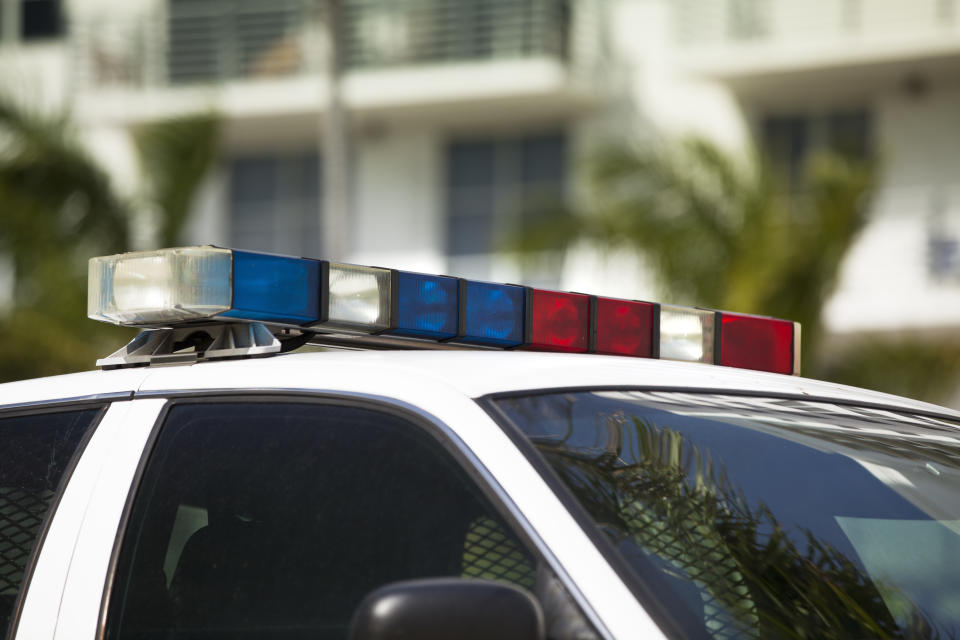 Two police officers used a coin toss to determine the fate of a speeding driver. (Photo: Getty Images)