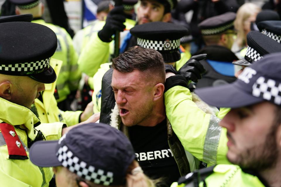 The EDL founder was escorted away by police as he tried to join the march (Jordan Pettitt/PA Wire)