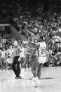 FILE - In this April 4, 1983, file photo, North Carolina State's Dereck Whittenburg (25) takes the shot which was to be dunked a spilt second later by teammate Lorenzo Charles to beat top-ranked Houston 54-52 in the NCAA college basketball championship game, in Albuquerque, N.M. The airball-turned-buzzer-beating dunk stunned top-ranked Houston. (AP Photo/File)