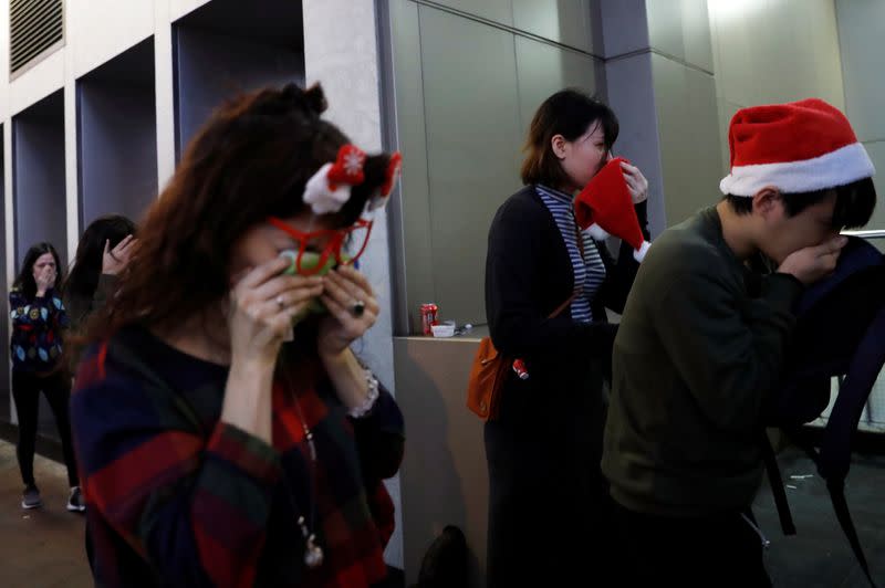 Anti-government demonstrators protest on Christmas Eve in Hong Kong