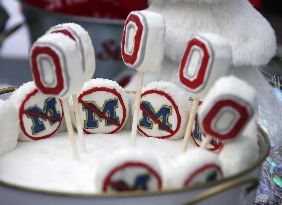 Rivalry-themed cake pops were served amongst the tailgate spread put out by Club 44 before Saturday's NCAA Division I football game between the Ohio State Buckeyes and the Michigan Wolverines at Ohio Stadium in Columbus on November 26, 2016. (Barbara J. Perenic/The Columbus Dispatch)