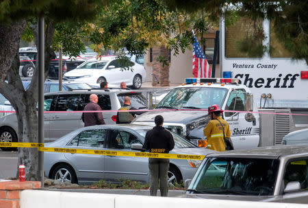 Police investigate the site of a mass shooting at a bar in Thousand Oaks, California, U.S. November 8, 2018. REUTERS/Ringo Chiu