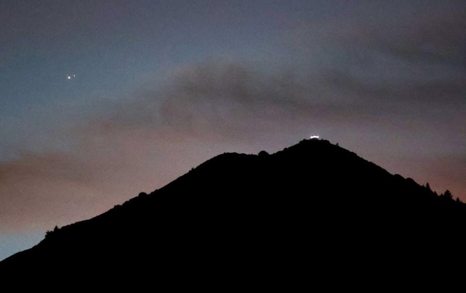 The Great Conjunction is seen above Mt. Tamalpais on December 21, 2020 in Larkspur, California.