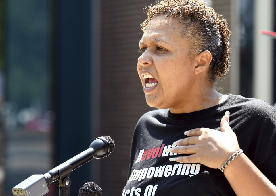 Community activist Candice Bailey speaks during a news conference in Aurora, Colorado, on Wednesday, July 28, 2021. Local activists and former members of Aurora's community police task force gathered to call attention to police brutality. Aurora police announced Monday that an officer was arrested after video showed him using his pistol to beat a man he was trying to take into custody, choking him and threatening to kill him, while another officer was accused of failing to stop her colleague. (AP Photo/Thomas Peipert)