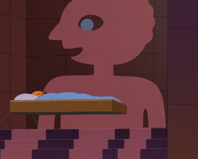 Prismo looking over a sleeping Jake