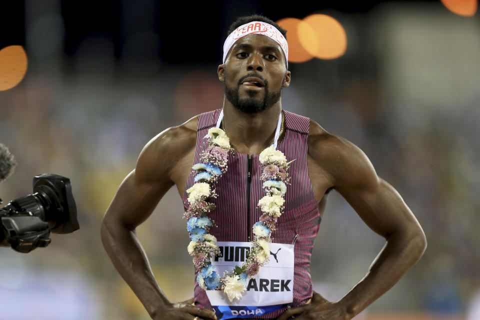Kenneth Bednarek, of the United States, reacts after winning the men's 200 meters during the Diamond League athletics meet at the Qatar Sports Club stadium in Doha, Friday, May 10, 2024. (AP Photo/Hussein Sayed)