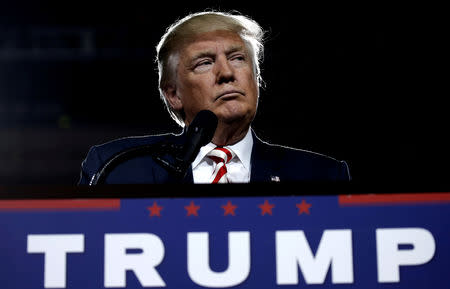 FILE PHOTO: U.S. Republican presidential nominee Donald Trump looks on during a campaign rally in Prescott Valley, Arizona, U.S., October 4, 2016. REUTERS/Mike Segar /File Photo/File Photo