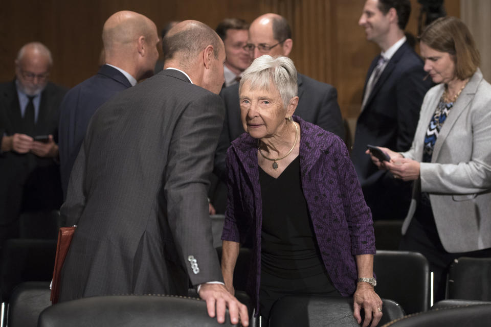 Eugene Scalia talks with his mother Maureen Scalia during a break in his nomination hearing for Labor Secretary before the Senate Committee on Health, Education Labor and Pensions on Capitol Hill, in Washington, Thursday, Sept. 19, 2019. Maureen Scalia is the widow of former Supreme Court Associate Justice Antonin Scalia. (AP Photo/Cliff Owen)