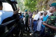 Supporters of Sri Lanka People's Front party presidential election candidate Gotabaya Rajapaksa gathered in front of his residence after he won the presidential elections in Colombo