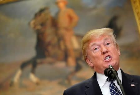 U.S. President Donald Trump speaks before signing a proclamation to honor Martin Luther King Jr. day in the Roosevelt Room of the White House in Washington, U.S., January 12, 2018. REUTERS/Joshua Roberts/Files