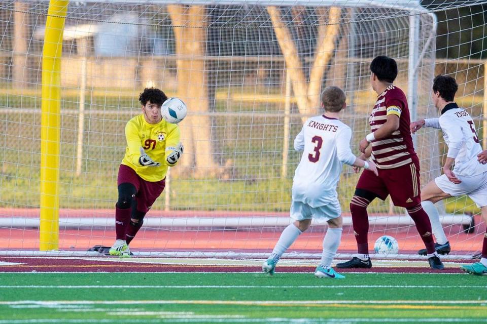 Golden Valley senior goalkeeper Manuel Zarco Zarate makes a save during a NorCal Regional playoff game against Las Lomas at Golden Valley High School in Merced, Calif., on Tuesday, Feb. 27, 2024. The Knights beat the Cougars 3-1 in penalty kicks.