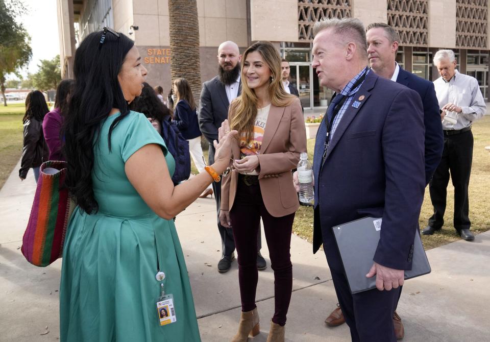 Jaxinta Shaffer, a social worker at Carl Hayden High talks to Sen. Anthony Kern of District 27 as Aliento, a leading voice for undocumented youth, DACA, and mixed immigration status families hosts its annual Education Day ("E-Day") at the Arizona state Capitol.