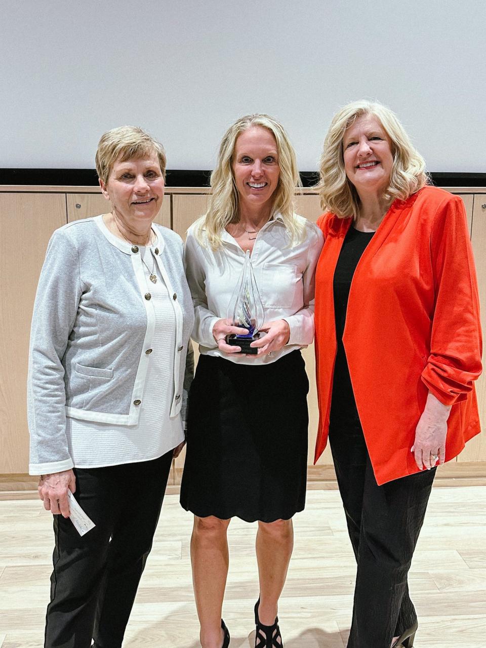 Kathy Russeau, left, Kristin Irwin and Sue Vanisacker at the Community Foundation of Monroe County's annual G.R.O.W. Spring Gathering. Irwin was honored at the 2024 G.R.O.W. Philanthropist of the Year.
