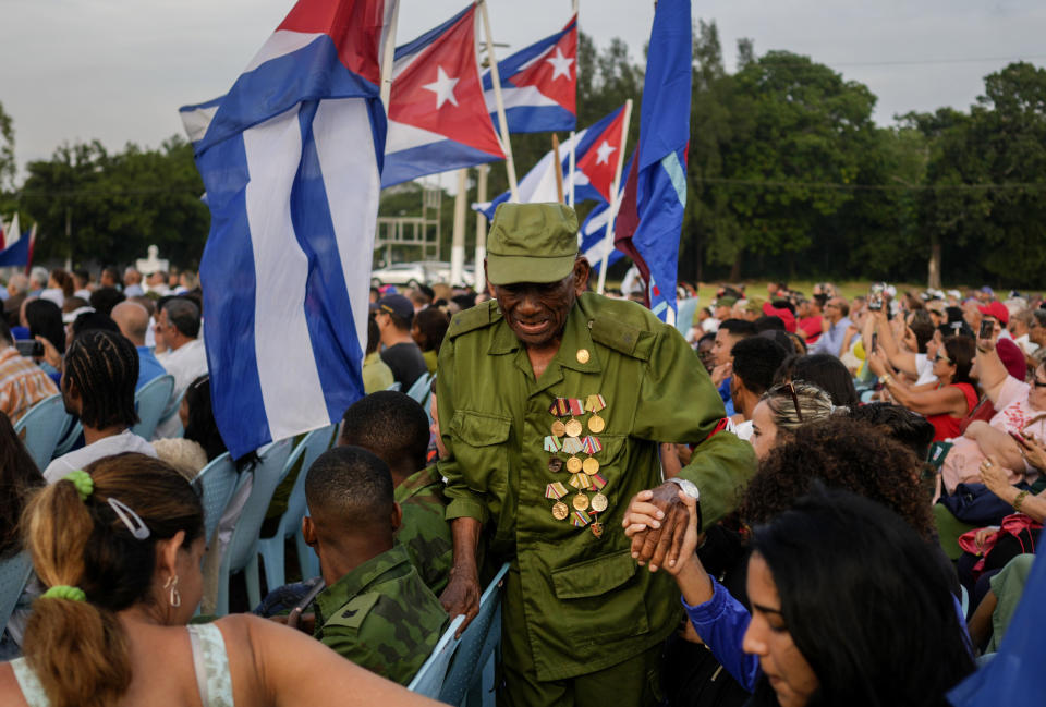 A veteran of the 1959 Cuban Revolution attends a ceremony marking the 65th anniversary of the arrival of Fidel Castro to the capital as head of the rebel army, in Havana, Cuba, Monday, Jan. 8, 2024. Castro and his rebels arrived in Havana via caravan on Jan. 8, 1959, after toppling dictator Fulgencio Batista. (AP Photo/Ramon Espinosa)