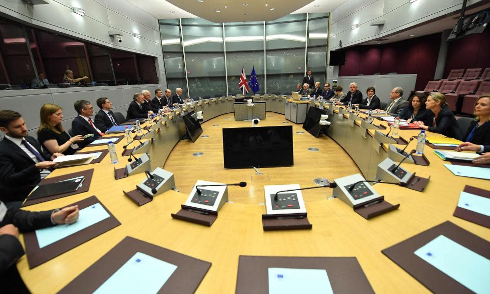 The British negotiating team (left) meet their EU counterparts in Brussels. 
