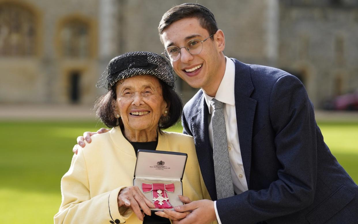 Lily Ebert with her MBE and great-grandson Dov Forman