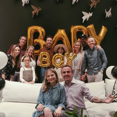 <p>Frankie Muniz Instagram</p> Frankie Muniz with his wife, Paige Muniz, and their families at their baby shower in October 2020