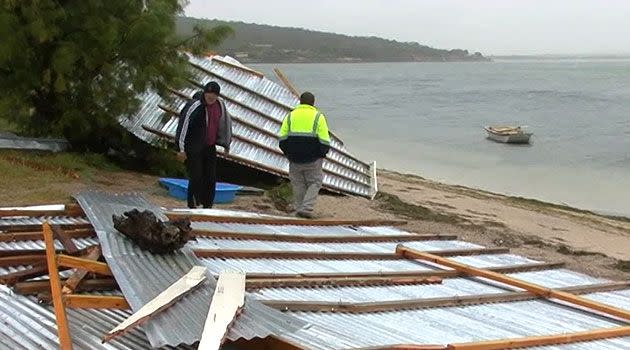 The roof of a shack was blown into the water at Kelladie Bay. Photo: 7News.