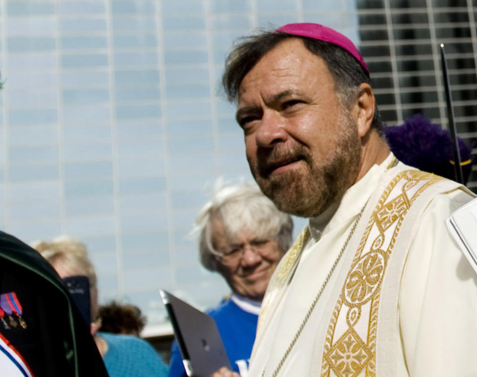 This Nov. 16, 2013 photo shows the Los Angeles auxiliary bishop, Monsignor Alexander Salazar in Garden Grove, Calif. Pope Francis has accepted the resignation of Salazar, following allegations of misconduct with a minor in the 1990s, officials said Wednesday, Dec. 19, 2018. (Kevin Sullivan/The Orange County Register via AP)